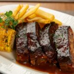 Coaste de porc in sos BBQ